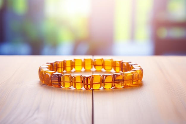 Amber necklace on white wooden background