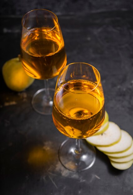 Amber or orange wine made from white grapes. in a tall wine glass. Georgian national wine according to old technology