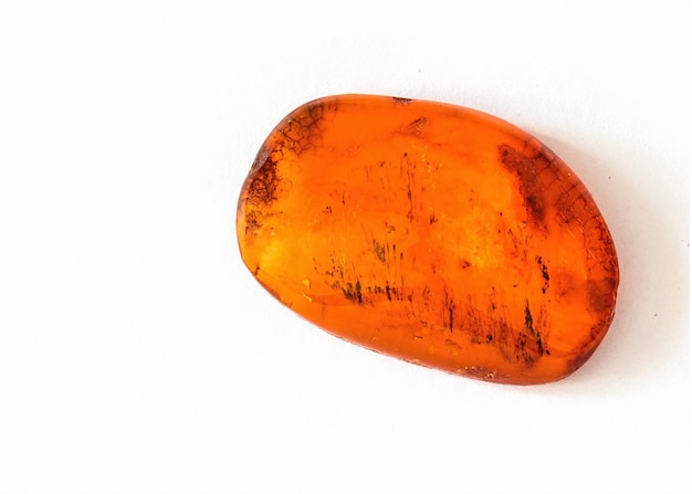 Amber stone, Sunstone isolated on white background.