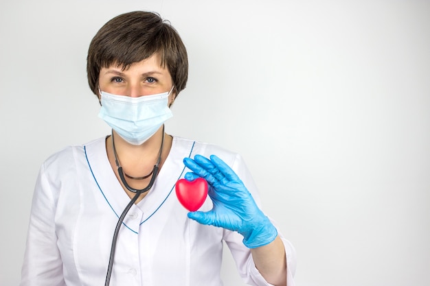 Ambulance. Cardiology Healthcare. Medicine doctor holding red heart shape in hand. Health care and patient, Failure and Diseases concept.