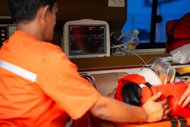 Photo ambulance emergency with emergency first aid pack and patient on stretcher