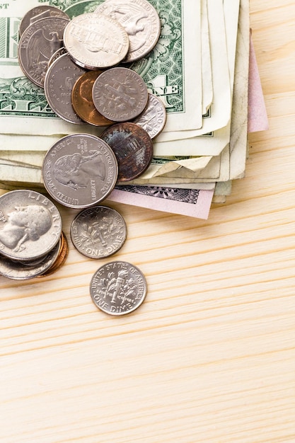 American bills and coins on the table.