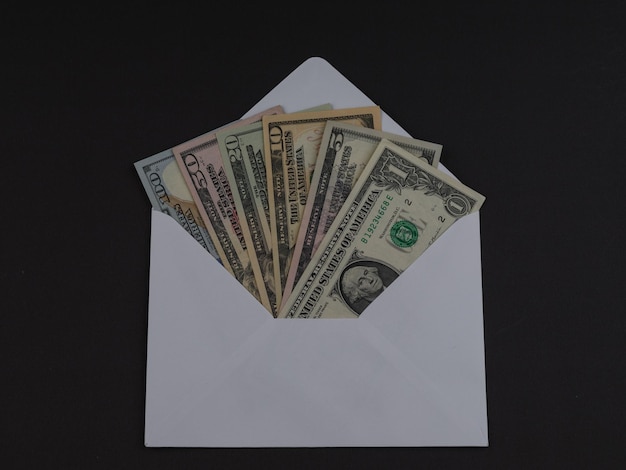 American dollar bills in envelope