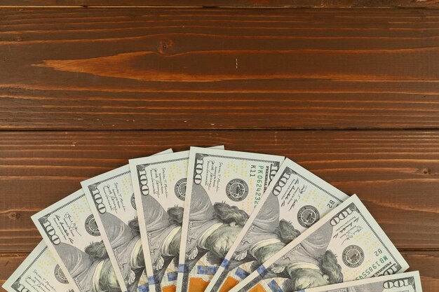 Photo american dollars money and wooden background place for text cope space