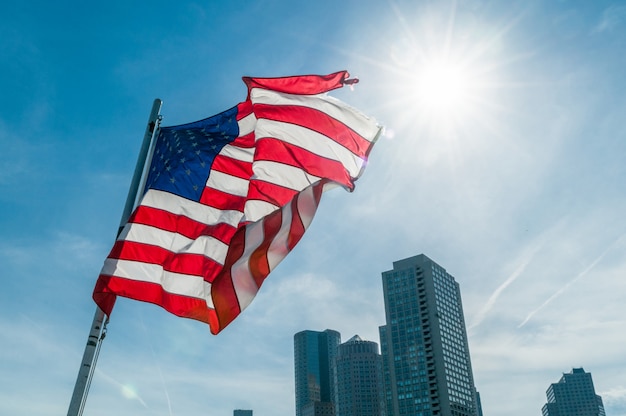 American flag against bright blue sky