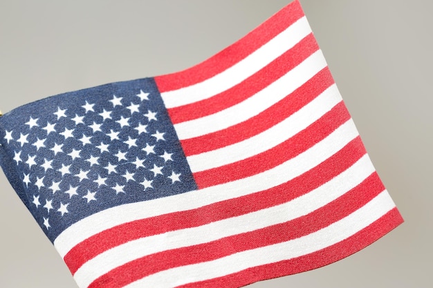 American flag on a background of artificial green grass