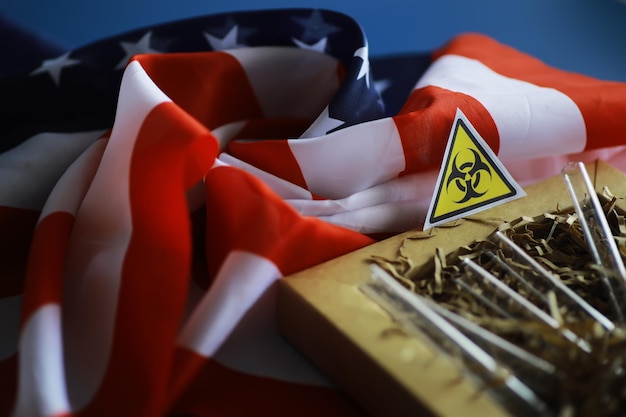 American flag and biohazard sign The concept of American biolabs and research centers