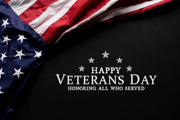 American flag on black background with text Happy Veterans Day.