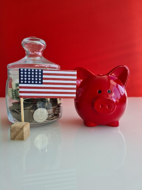 American flag piggy bank with coin and piggy bank closeup