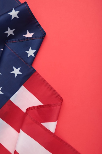 American flag on red surface with copy space