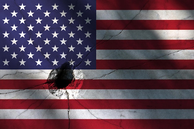 American flag with big crack or bullet hole Military conflict and war in country concept background photo