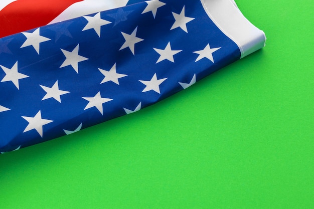 american flags against a green background