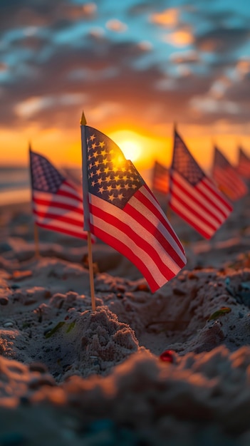 Photo american flags on the beach with the sun setting behind them memorial day or independence day