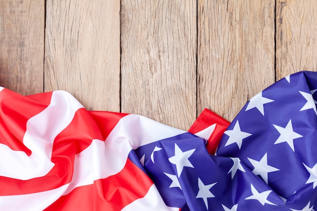 American flags on old wood for background