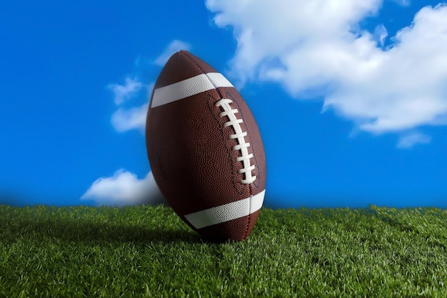 American football ball on black background american football on\
green grass
