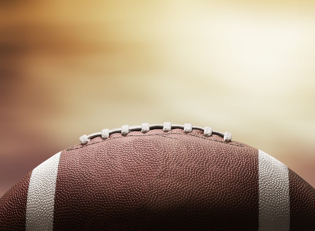 American football ball on black background