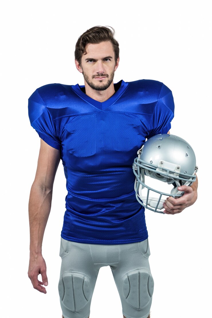 Photo american football player holding an helmet