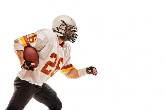 Photo american football player in motion with the ball