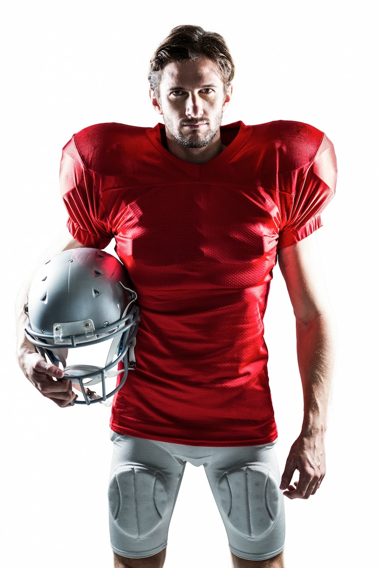 Photo american football player in red jersey holding helmet