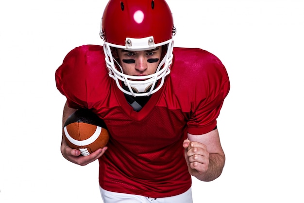 American football player running with the ball