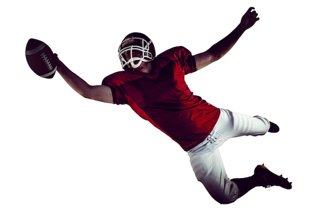 Photo american football player scoring a touchdown on a white background