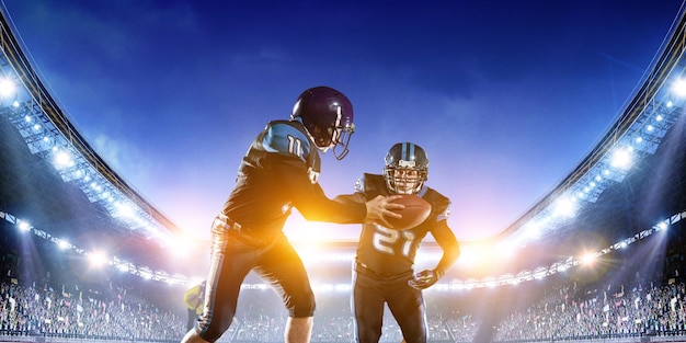 american football players on the field during game. mixed media