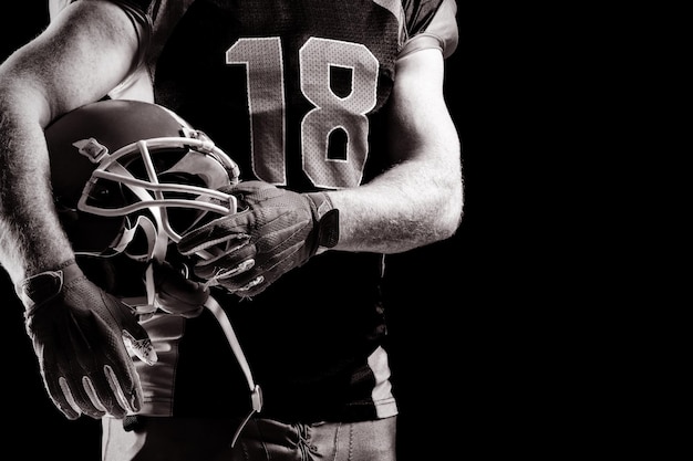 American football-speler met rugbyhelm