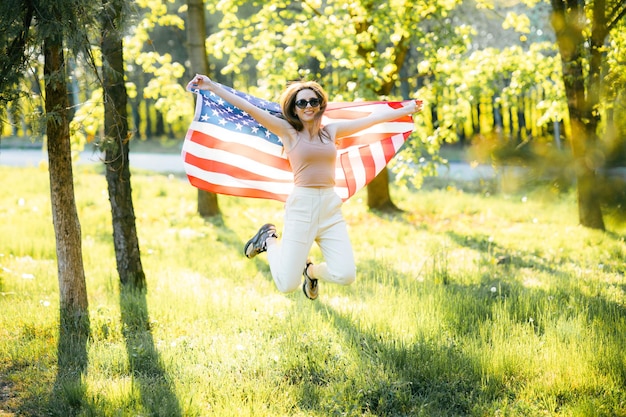 American girl Happy young woman with USA flag