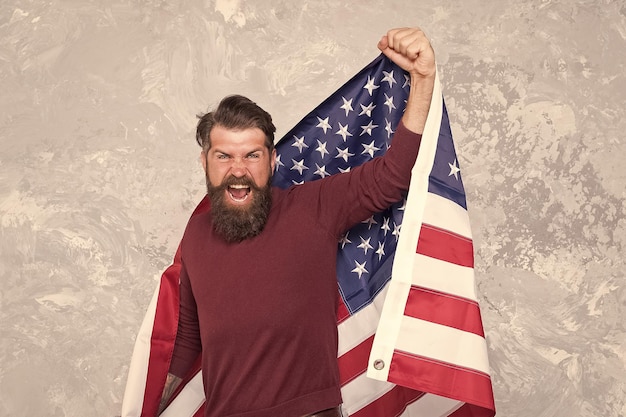 Photo american hipster man celebrate independence day with national flag social protest concept