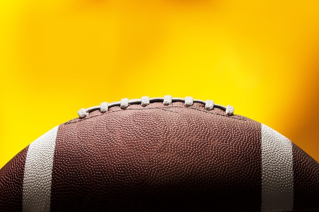 Photo american leather football ball on background