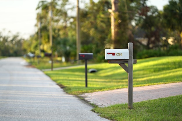 Photo american mailbox at florida home front yard on suburban street side