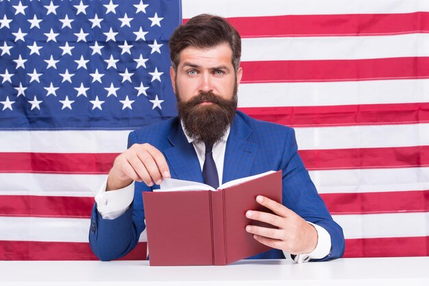 American man entrepreneur businessman usa flag background professional lawyer concept