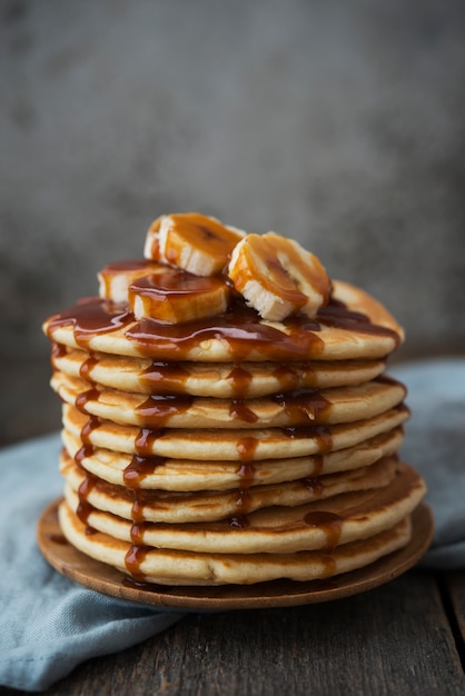 American pancakes with banana and caramel