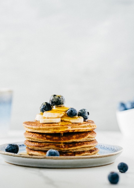 American pancakes with blueberry and golden honey Healthy morning breakfast