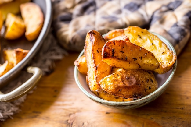 american roasted potatoes with smoked bacon garlic salt pepper cumin dill parsley  herb decoration