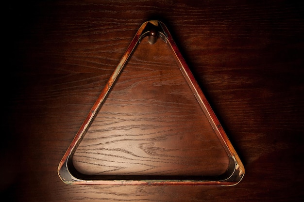 American Russian billiards, Empty triangle for billiards on a wooden background.