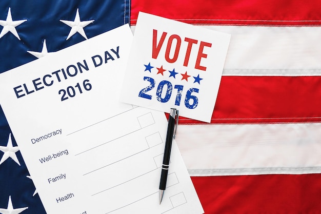 Photo american vote concept ballot for presidents election 2016 on stars and stripes background