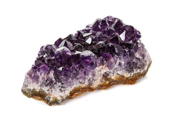 Amethyst Crystal Druse macro mineral on white background close up