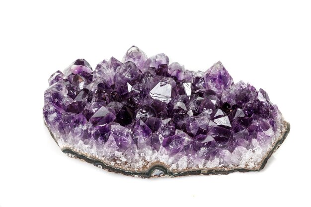 Amethyst Crystal Druse macro mineral on white background close up