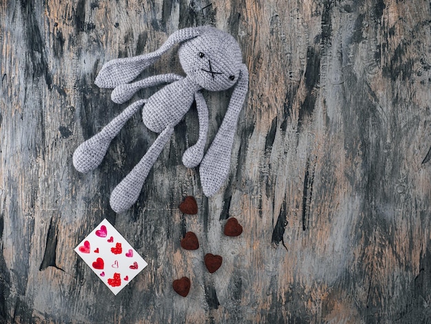 Amigurimi grey hare handmade greeting card with hearts