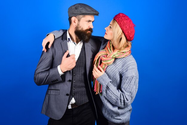 Amorous happy couple handsome bearded man embracing girlfriend cute couple in warm clothes copy