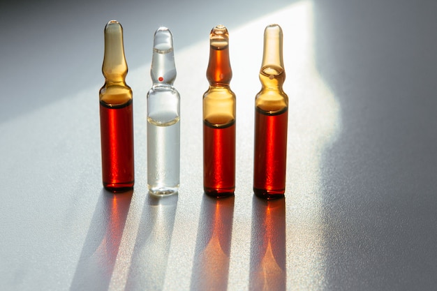 Ampoules in the sun on the table