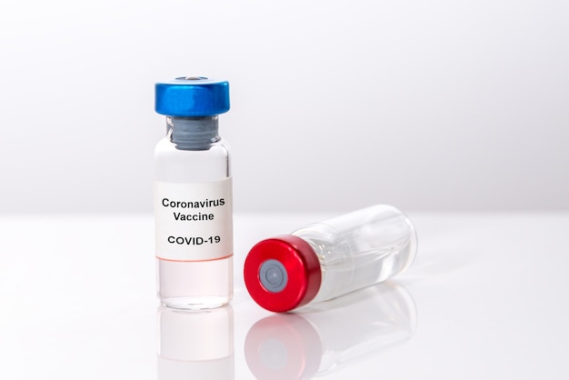 Ampoules with Covid-19 vaccine on a laboratory bench