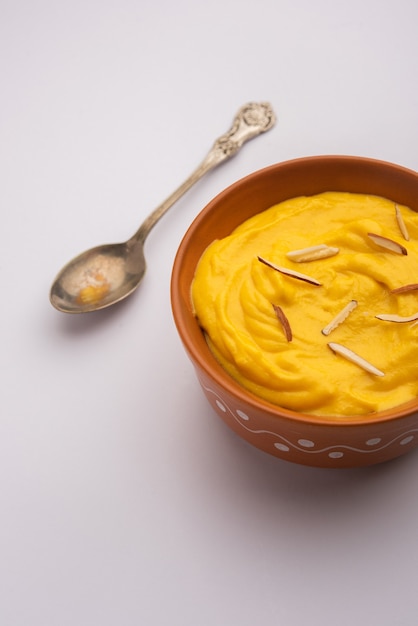 Amrakhand is an Alphonso flavoured Yogurt or Shrikhand, Popular Indian sweet served with dry fruits & Saffron