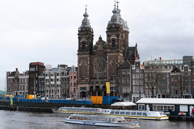 AMSTERDAM, NETHERLAND - FEBRUARY 25 2020 - Central station old town