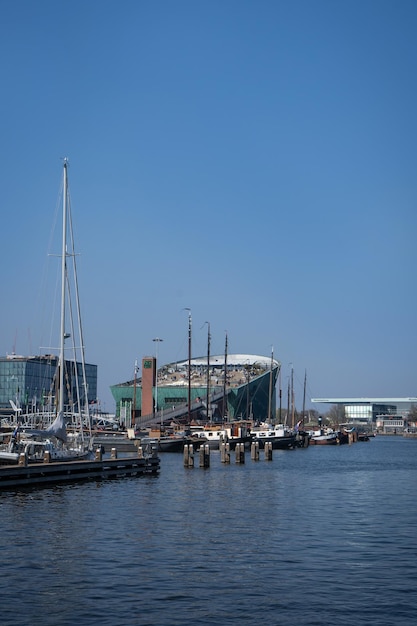 Amsterdam Netherlands March 29 2022 NEMO science center of Amsterdam Maritime museum near Amsterdam Centraal Station Futuristic building exterior at a sunny day in summer