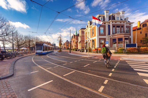 Amsterdam tram flag and dutch houses