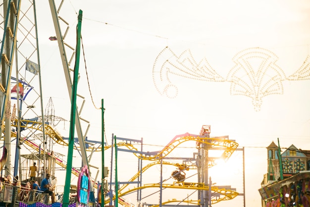 Amusement park ride against sky