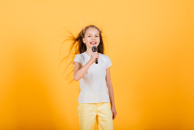 Amusing female with microphone showed herself in the photos in all her glory, 