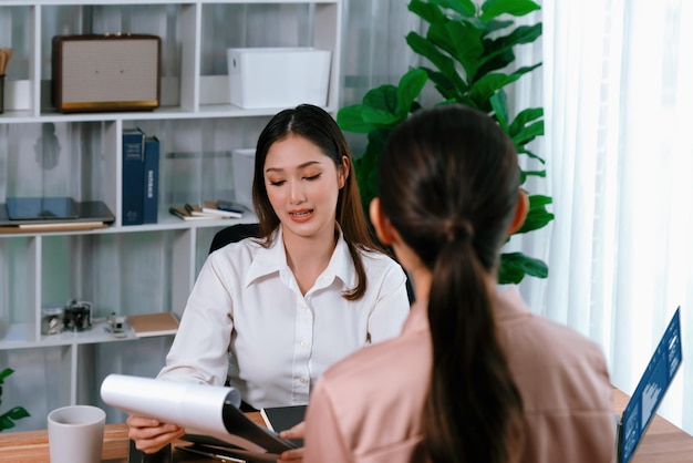 Analyst team colleague discuss financial data on digital dashboard Enthusiastic